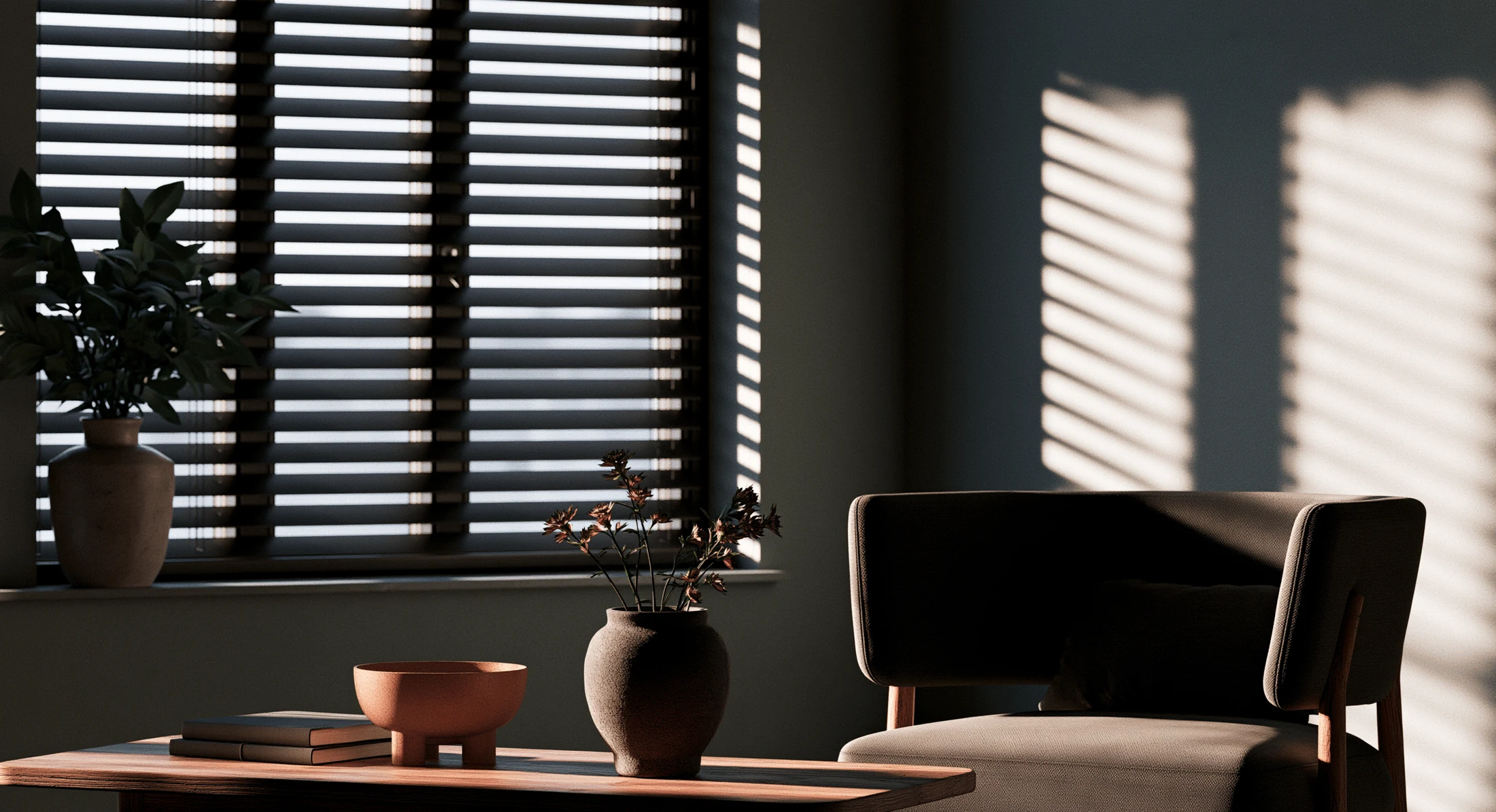 A wooden venetian blind across a window, its slats throwing banded light onto the wall of a quiet room.
